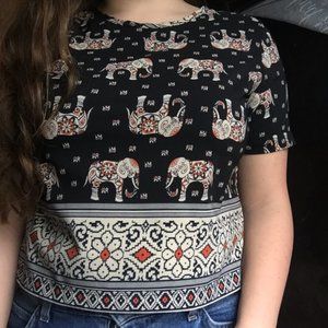 Flattering top with eccentric design